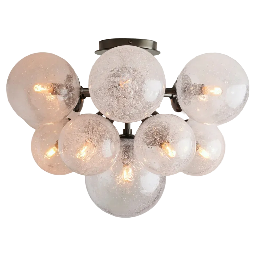 Chandelier with multiple glass globe lights on a gray background